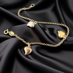 Ladies 18ct gold charm bracelet